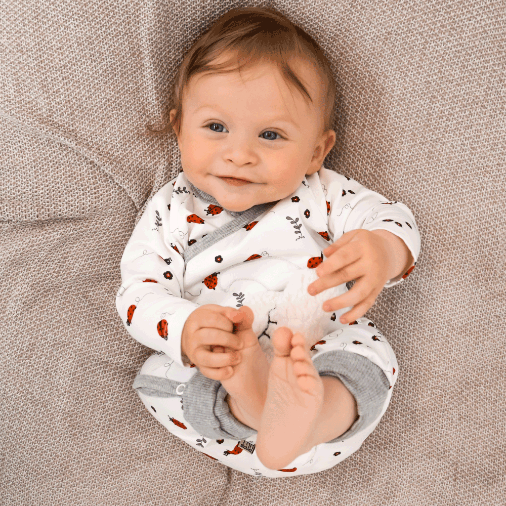 Geschenk zur Geburt Wickel-Schlafanzug mit Marienkäfer Muster mit Platz für Sensor & Wärmekissen