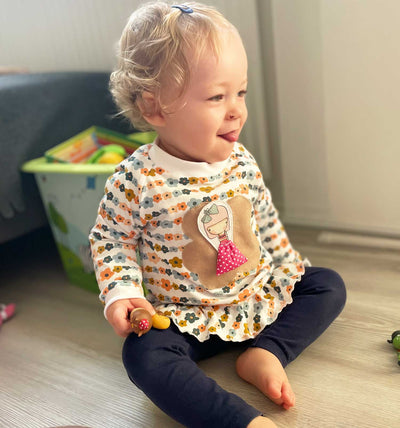 Geblümtes Baby Shirt-Kleid mit Rüschen