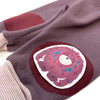 Monster Motiv Knieschoner Pads für Baby Krabbelhosen im Detail n Violetter Farbe