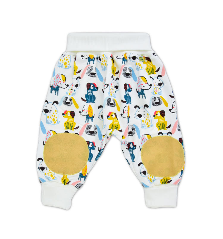 Babyhose in naturweiß mit Hunde-Motiven